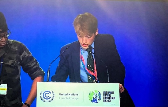 James speaking at COP26
