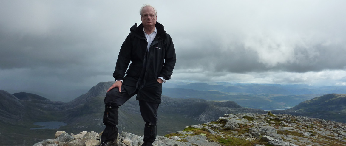 Lord Chris Smith atop a Munro